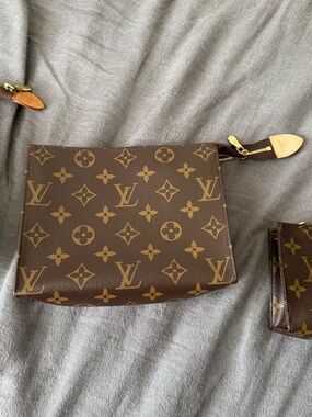 Louis Vuitton Monogram Pouch in Brown (Medium)